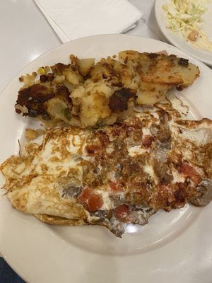 Egg white omelette with Swiss, mushrooms and tomatoes with home fries- very good!