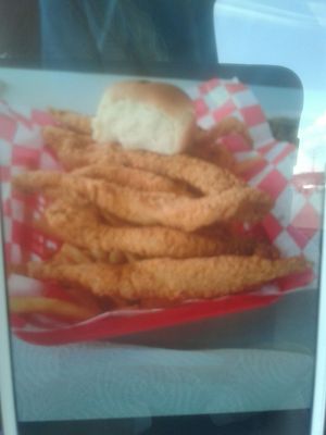 Fish strips, fries, green beans and sweet tea. Good southern food.