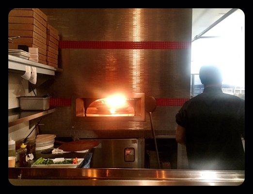 Thin crust wood fired pizza