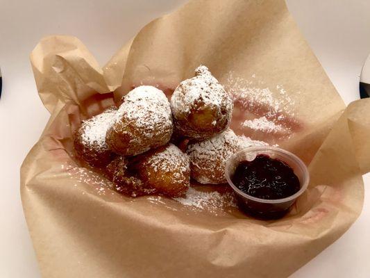 Zeppole doughnuts with berry jam