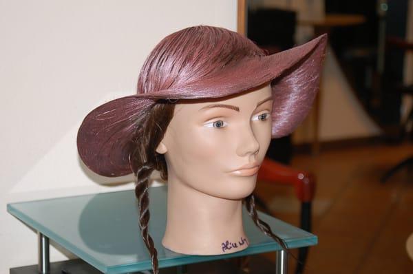 Top part of hair  was colored and shaped into a hat by Alice Wong.