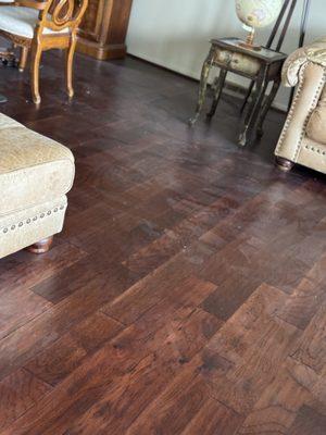 This is a photo of wood floor prior to cleaning. 
We guarantee satisfaction on all cleaning services.