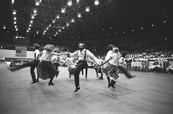 Kickapoo Cloggers do the Big Kick as part of one of their dance routines.