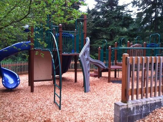 Great, recently upgraded play structure on the SW corner of the lot. Lots of good shade in the summer.