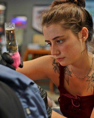 Kali making Tattoos at Tustin Street Tattoo.