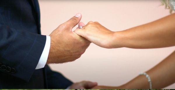 Lovely shot of bride and groom during wedding ceremony.