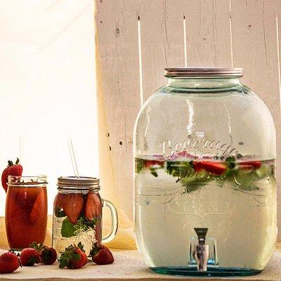 Serve hot or cold liquids from this 422oz recycled glass jar with spigot. A perfect beverage dispenser for team gatherings or entertaining.