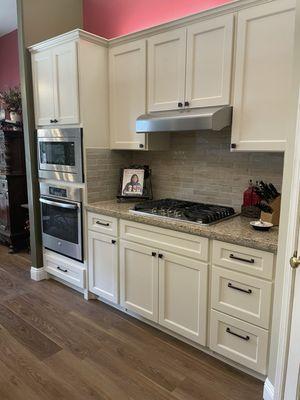 We love our new granite and backsplash!