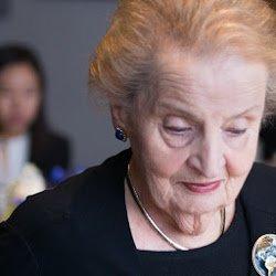 Former Secretary of State Madeleine Albright wearing her custom pin created by Stucchi Jewelers