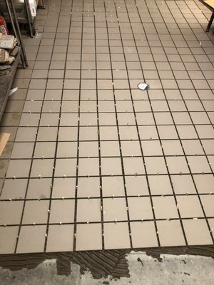 Tile floor repair with new drain