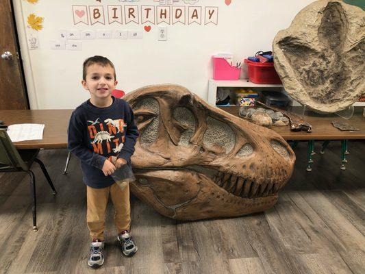 Dinosaur Rocks came to visit. We learned so much about dinosaurs and got to touch real fossils!!!