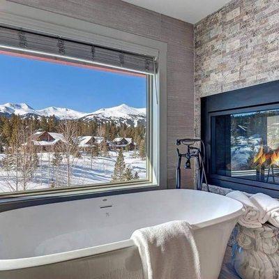 Beautiful bathroom with stunning views makes cleaning this home a pleasant experience!