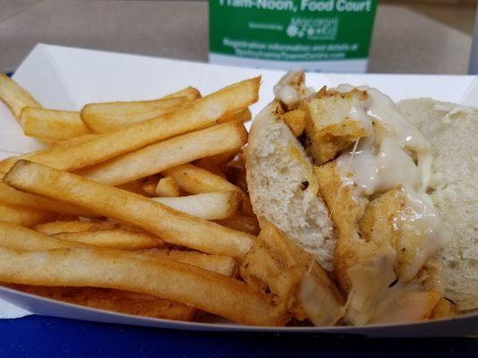 Kids chicken slider with provolone and fries.