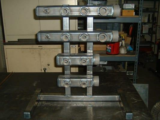 Injection press water manifold