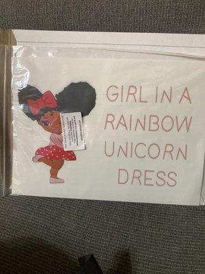 She's supposed to be wearing a rainbow unicorn dress smdh