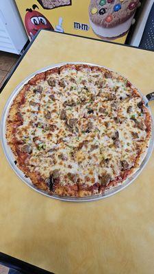 X-Large, hand tossed, Hometowne Deluxe pizza (pepperoni, sausage, onions, and green peppers).