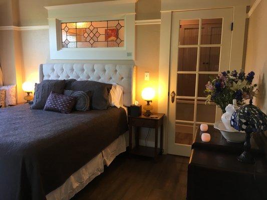 The romantic and roomy studio suite has a bedroom, kitchenette and spa-like bathroom.