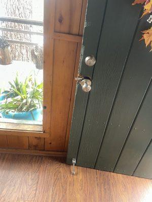 Rotted out doorknob Robin refused to fix