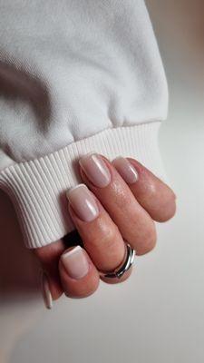 Elegant French manicure with classic nude bases and crisp white tips