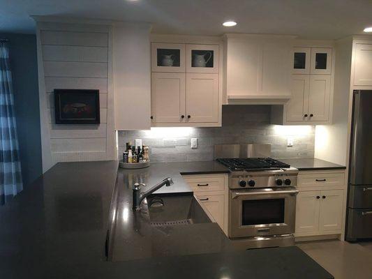 Finished kitchen with custom cabinets.