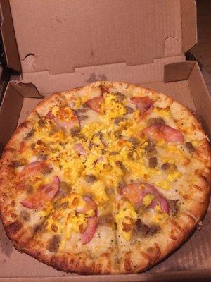 Small breakfast pizza. On the menu is $10.99 but when it arrived it was $12.99. Caveat emptor (buyer beware).