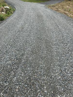 Driveway repair with denses graded material