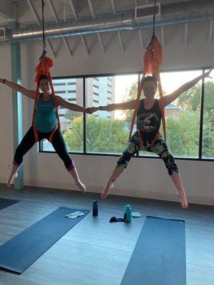 Aerial yoga in the moon room in the studio