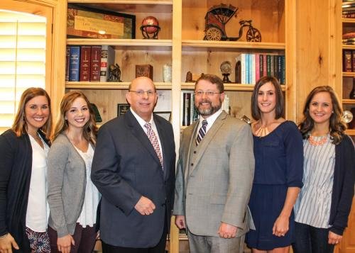 Steve Rimmer (center left) and his team