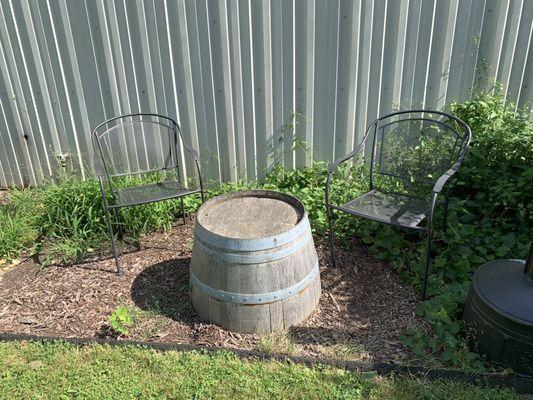 Outside seating complete with barrel table.