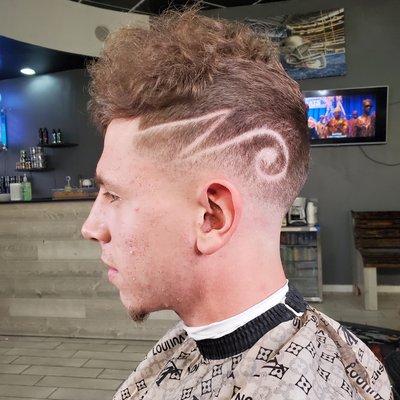 Bald Mid Fade and Creative Part