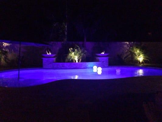 Pool at night with colored lights on