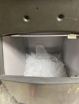 Ice bin getting sanitized