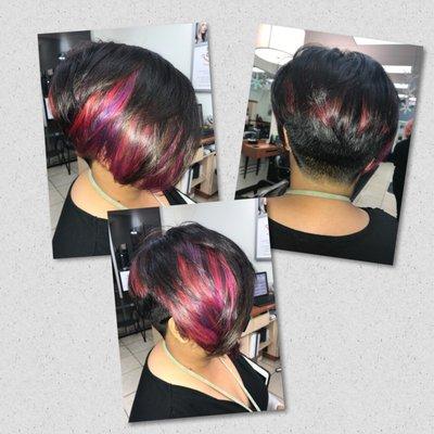 Funky pinks and purple peek-a-boos on a stacked asymmetrical short bob.