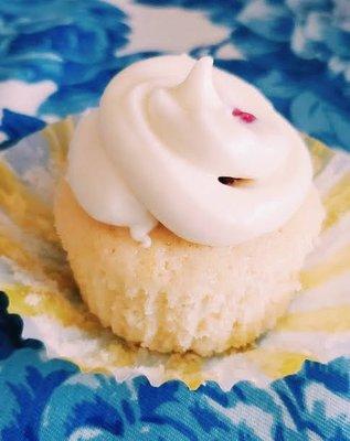 Lemon Raspberry Cupcake: lemon cupcake with raspberry compote and raspberry center with cream cheese frosting