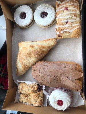 Blueberry square, eclair, apple turnover, strawberry Danish, Raspberry cookies