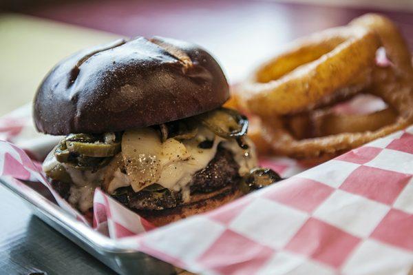 Our 6oz patty served on a pretzel bun, grilled onions and jalapenos with pepperjack cheese!