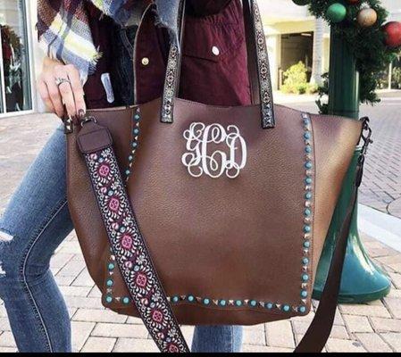 Monogrammed Guitar strap handbag.