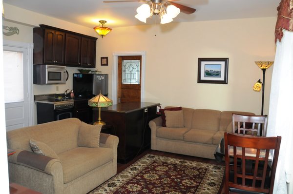 The Holly Suites Living Room and Full Kitchenette.