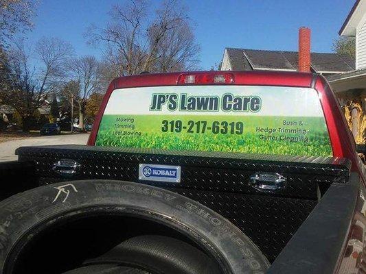 Full Print Perforated Vinyl we designed, printed, and installed for JP's Lawn Care.