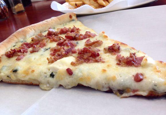 1 slice of artichoke pizza with bacon!