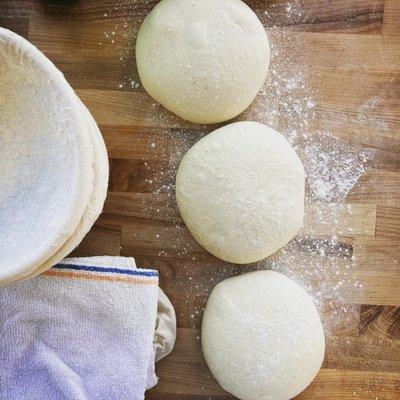 Homemade sourdough boules and pain l'ancienne baguettes baked fresh daily.