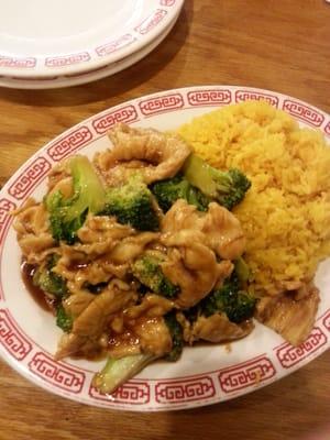 Chicken and broccoli with plain fried rice.