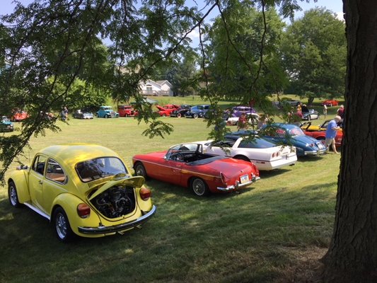 Cars on our showfield during our Grand Opening Party in July 2018.