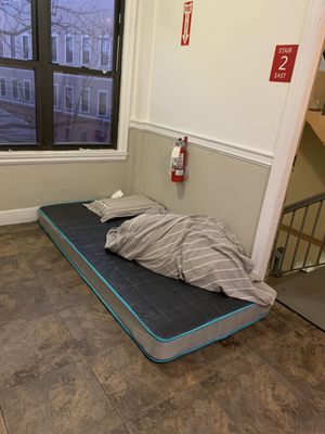 Someone sleeping in hallway