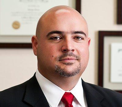 Enrique Ferrer, Esq., Founder and Managing Partner