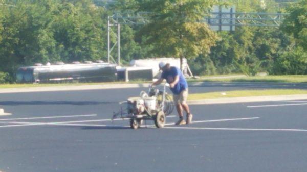 Striping a parking lot.