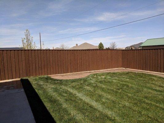 Fence stained with Wood Defender Sable Brown