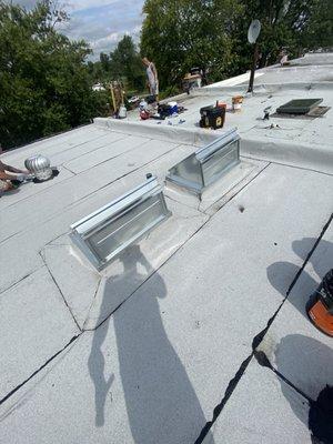 2 Skylights, New white granulated torch down Rubber