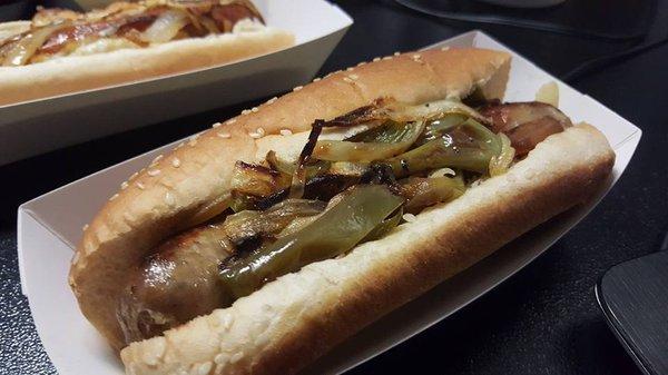 Italian sausage topped with caramelized onions and green bell peppers