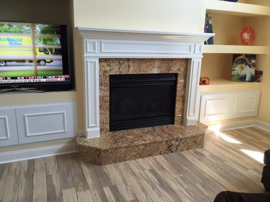 New flooring 
Granite fire place 
Cabinets on each side of the fire place